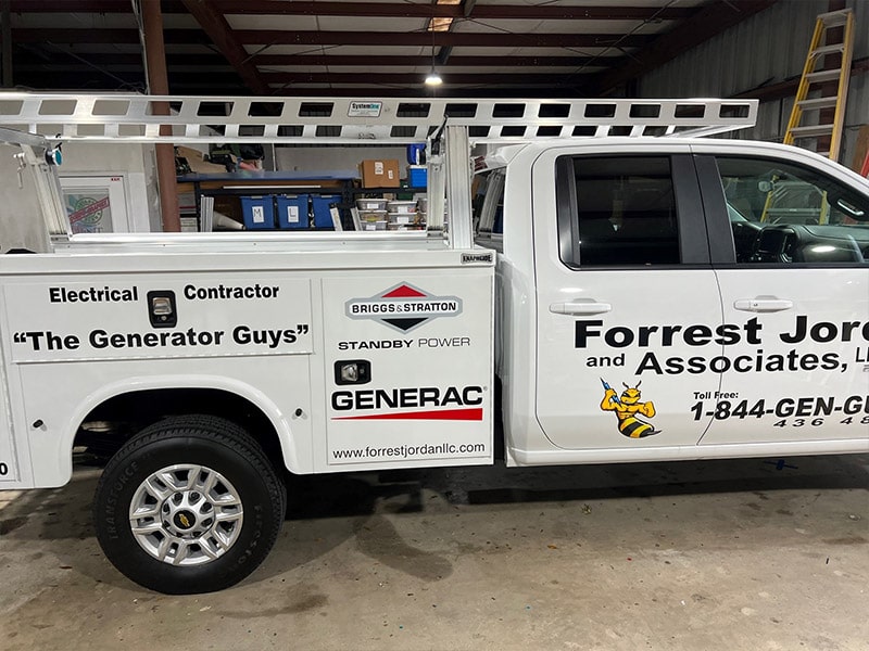 generator guys service truck parked in garage