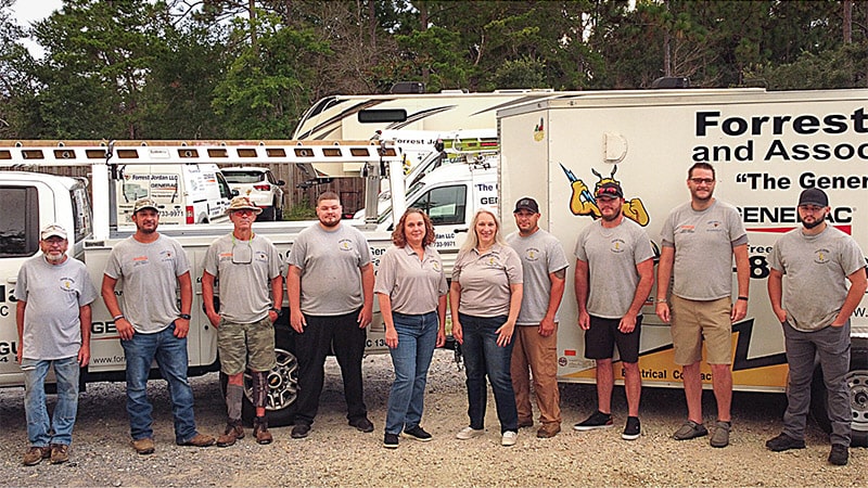 installation crew standing outside truck in gulf breeze headquarters location
